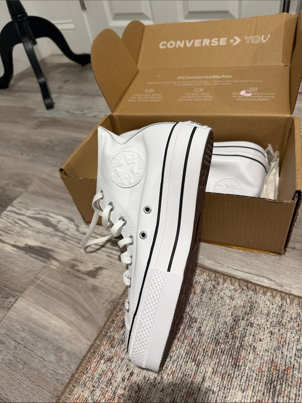 Converse White High-Top Platform Sneakers with Black Stripe